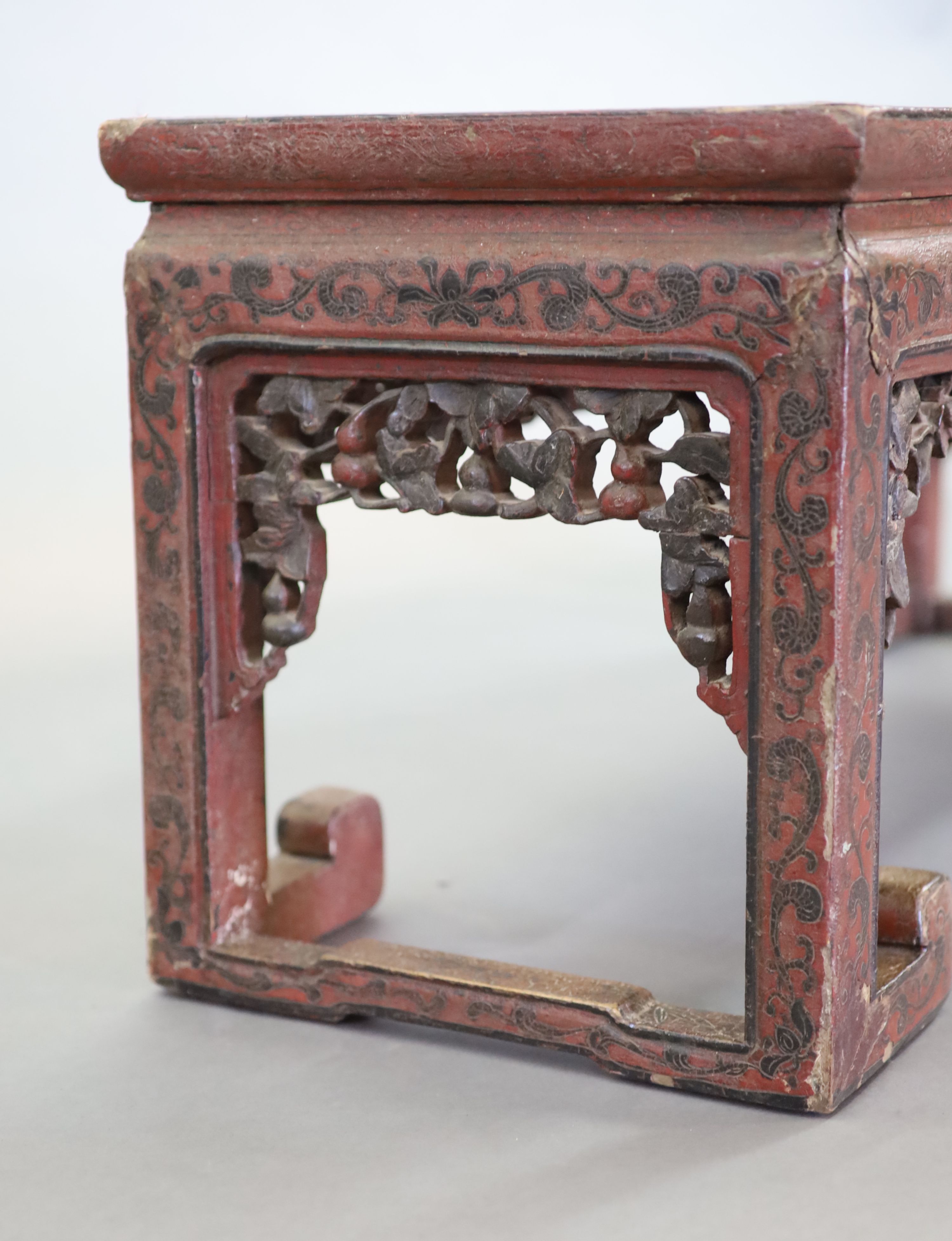 A Chinese coromandel lacquer table or stand, 18th century, 88cm long, 31.5cm long, 35cm high, losses